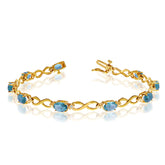 10K Yellow Gold Oval Blue Topaz Stones And Diamonds Infinity Tennis Bracelet, 7" fine designer jewelry for men and women