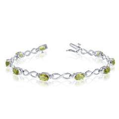 10K White Gold Oval Peridot Stones And Diamonds Infinity Tennis Bracelet, 7" - JewelryAffairs
