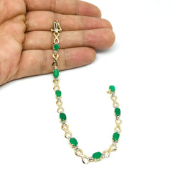 14K Yellow Gold Oval Emerald Stones And Diamonds Infinity Tennis Bracelet, 7" fine designer jewelry for men and women