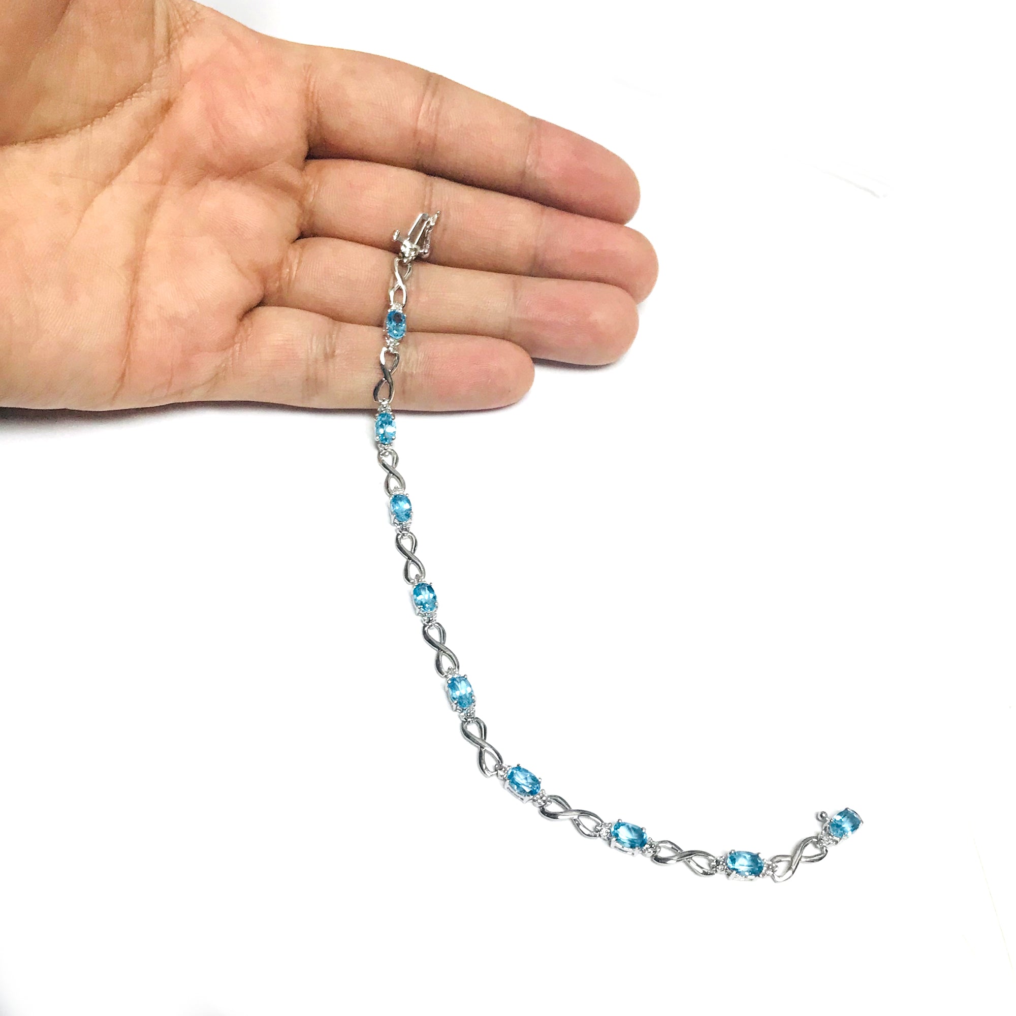 14K White Gold Oval Blue Topaz Stones And Diamonds Infinity Tennis Bracelet, 7" fine designer jewelry for men and women