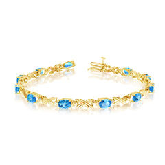 14K Yellow Gold Oval Blue Topaz Stones And Diamonds Tennis Bracelet, 7" fine designer jewelry for men and women